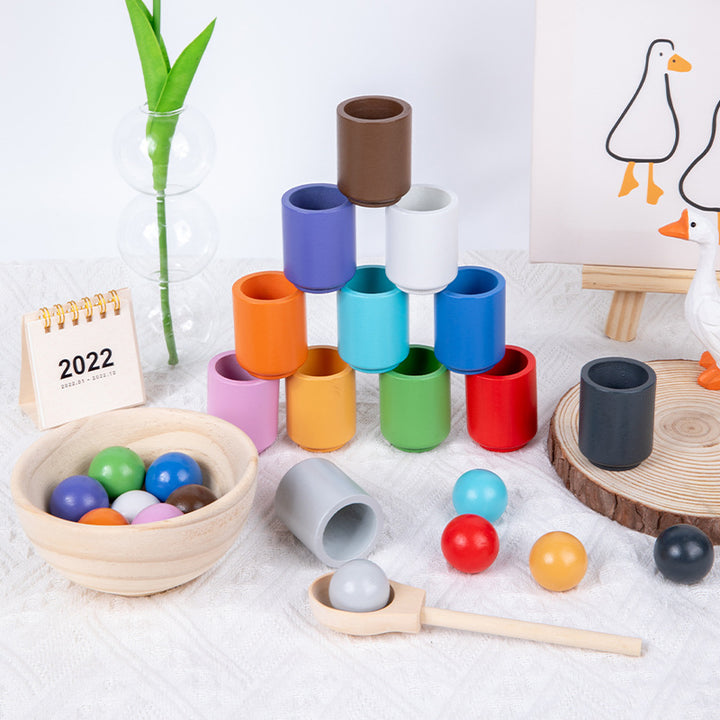Lernspielzeug Holzfarbschale und Kugeln